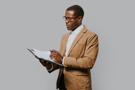 businessman-looking-through-reports-2022-12-16-00-10-39-utc.jpg businessman-looking-through-reports-2022-12-16-00-10-39-utc.jpg